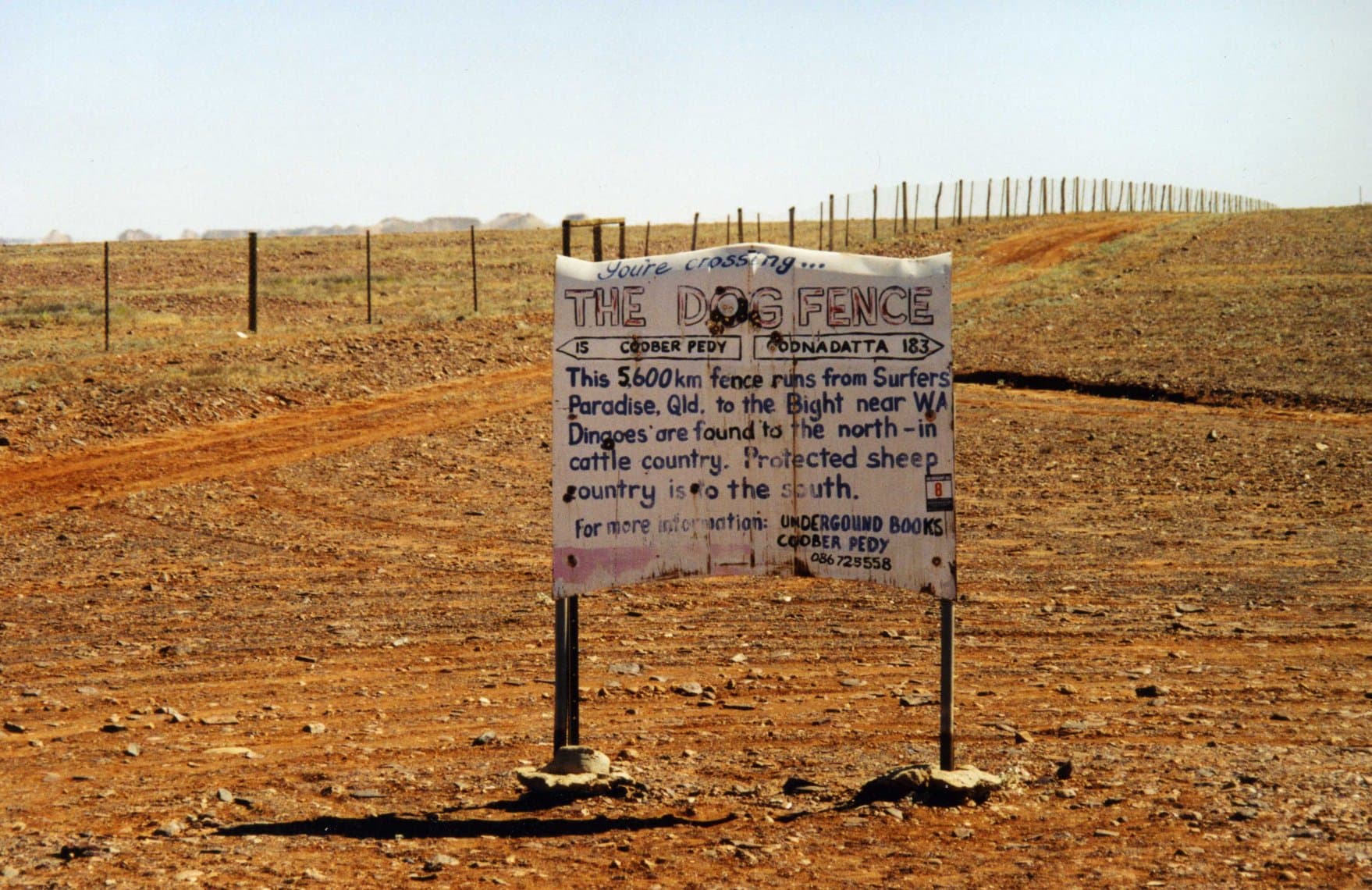 The Dingo Fence stretching across open country near Coober Pedy, South Australia