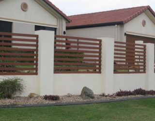 Rendered wall with timber slats